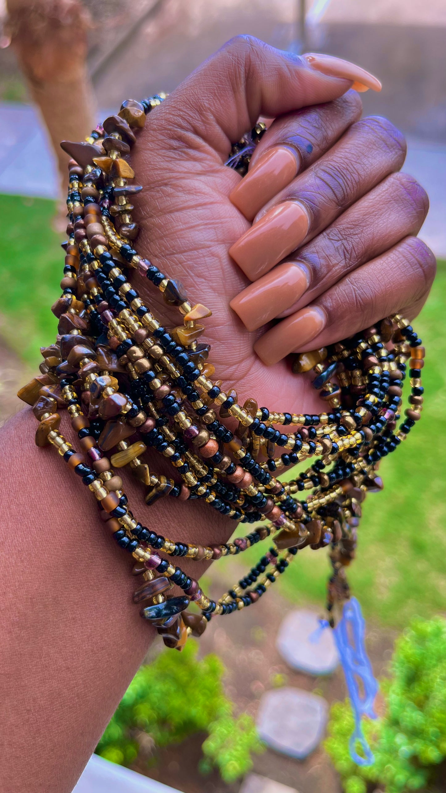 Traditional tie on African waist beads called Silken Sable waist beads, features brown, bronze, gold and black beads with Tiger’s eye gemstones. Ghana Waist Beads, plus size waist beads, extended length waist beads